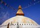 Nepal: Worshippers below the all-seeing eyes of the great dome of Bodhnath (Boudhanath) stupa, Kathmandu